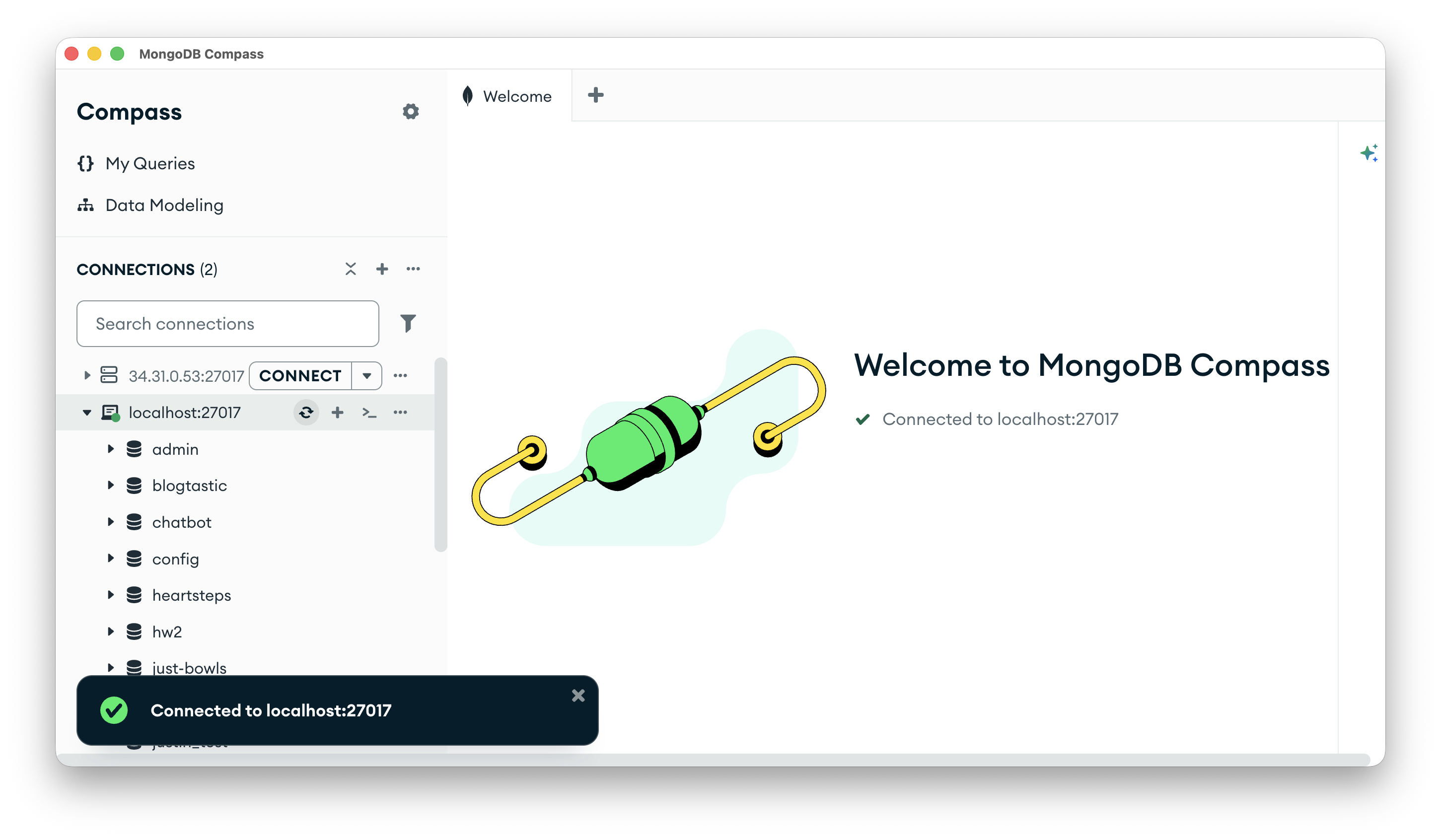 MongoDB Compass with "Connected to localhost:27017" and the list of databases on that server expanded in the sidebar.